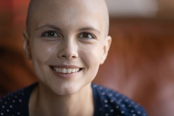 Survivor smiling post-treatment