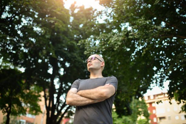 A cancer survivor reflecting on their healing journey after treatment